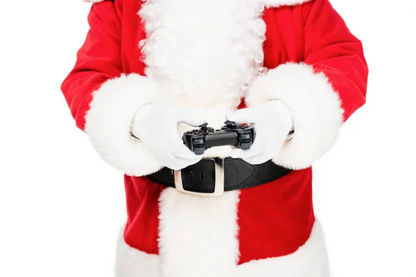 Abgeschnittene Aufnahme von Weihnachtsmann beim Videospiel mit Gamepad isoliert auf Weiß — Stockfoto