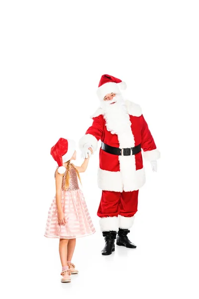 Père Noël claus et petit enfant tenant les mains isolées sur blanc — Photo de stock