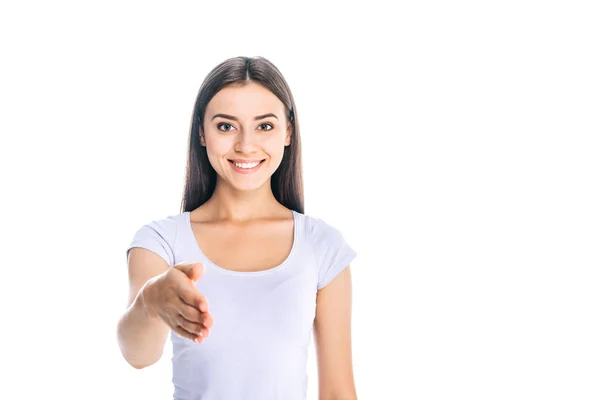 Portrait of smiling woman outstretching hand for handshake isolated on white — Stock Photo