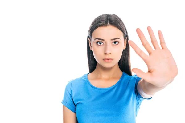 Retrato de mujer seria con la mano extendida aislada en blanco - foto de stock