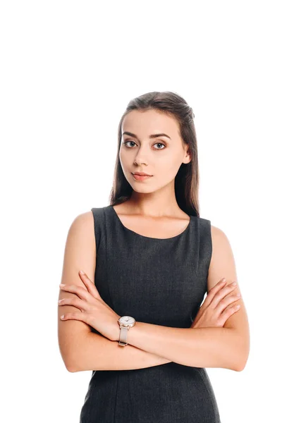 Retrato de jovem mulher em vestido preto com braços cruzados isolado em branco — Fotografia de Stock