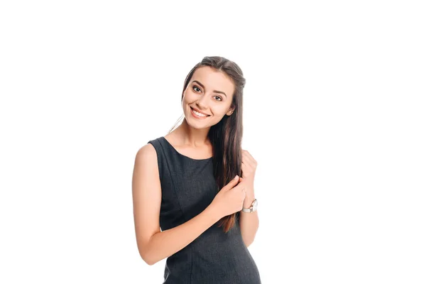 Portrait of young positive woman in black dress isolated on white — Stock Photo