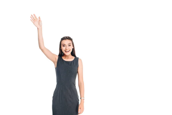 Portrait of cheerful woman in stylish black dress greeting someone isolated on white — Stock Photo