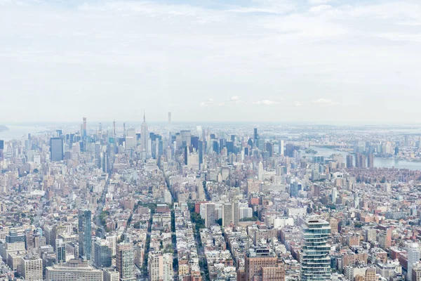 Aerial view of new york city skyscrapers and cloudy sky, usa — Stock Photo