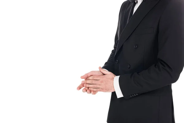 Vue recadrée de l'homme posant en smoking élégant noir isolé sur blanc — Photo de stock