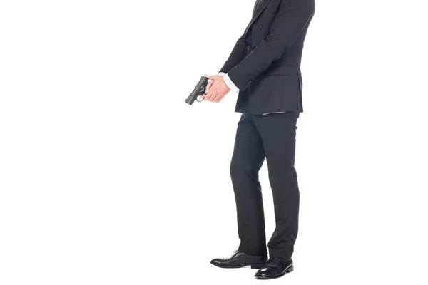 Cropped view of killer in black suit holding gun, isolated on white — Stock Photo