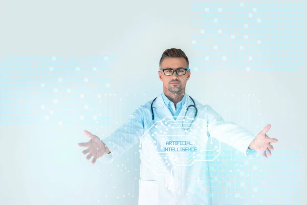 Handsome doctor in glasses with stethoscope on shoulders standing with open arms with brain interface and artificial intelligence lettering — Stock Photo