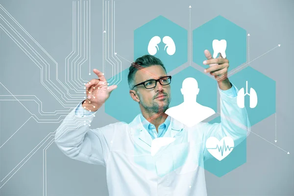 Handsome scientist in white coat and glasses moving medical interface in air isolated on white, artificial intelligence concept — Stock Photo