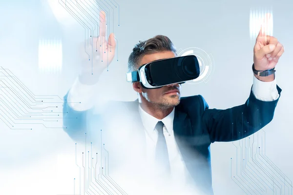 Businessman in virtual reality headset touching innovation technology isolated on white, artificial intelligence concept — Stock Photo