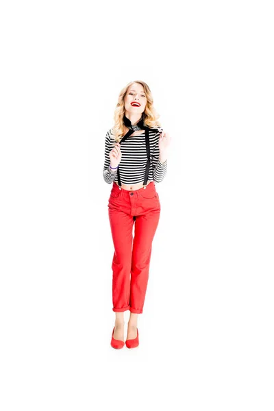 Attractive woman smiling while standing in french clothing isolated on white — Stock Photo