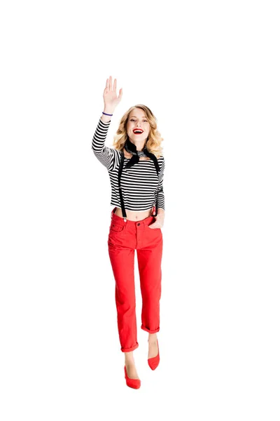 Smiling blonde woman waving hand isolated on white — Stock Photo