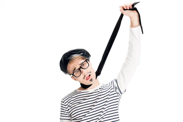 Man in black beret and glasses pretending killing himself with scarf isolated on white — Stock Photo