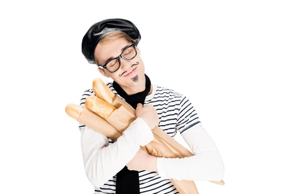 Französisch Mann umarmt leckere Baguettes mit geschlossenen Augen isoliert auf weiß — Stockfoto