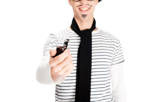 Vista cortada de alegre francês homem segurando tubo isolado no branco — Fotografia de Stock