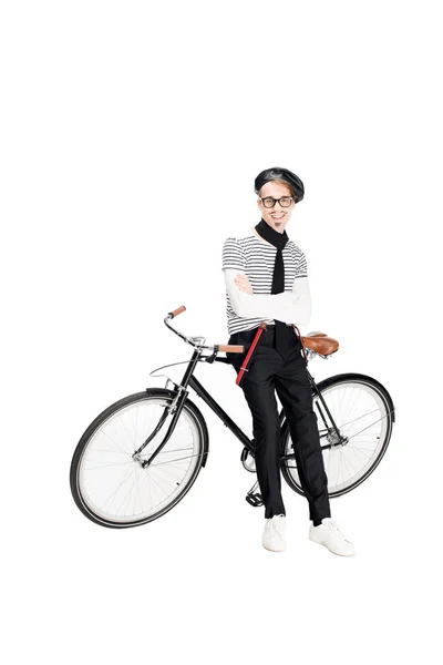 Cheerful french man standing near bicycle isolated on white — Stock Photo