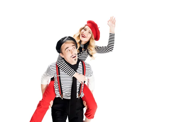 French man holding in arms happy girlfriend in red beret waving hand isolated on white — Stock Photo