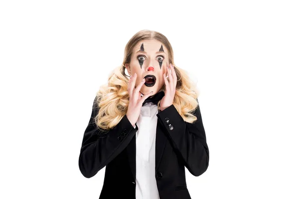 Scared female clown standing in suit isolated on white — Stock Photo