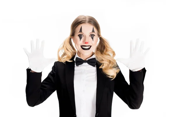 Excited female clown smiling while showing white gloves isolated on white — Stock Photo