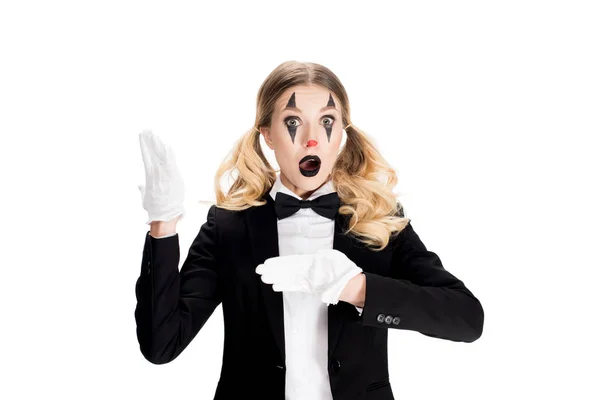 Shocked blonde clown standing in suit and gesturing isolated on white — Stock Photo