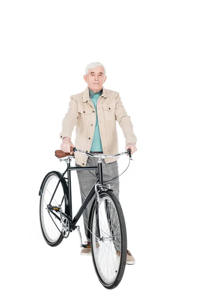 Allegro pensionato in possesso di bici isolato su bianco — Foto stock