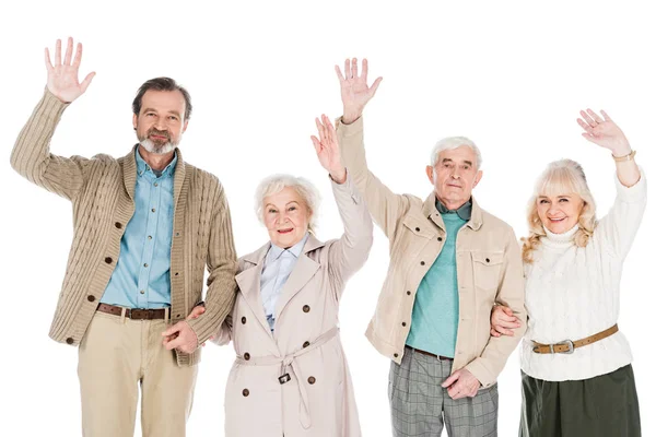 Cheerful retired people waving hands isolated on white — Stock Photo