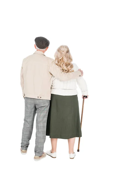 Vista posterior de la pareja de ancianos de pie aislados en blanco - foto de stock