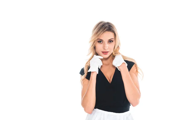 Blonde housemaid in black uniform and gloves isolated on white — Stock Photo