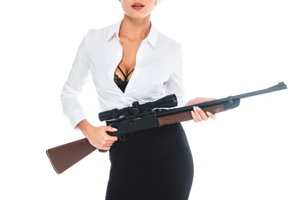 Cropped view of teacher in blous with open neckline and skirt holding rifle isolated on white — Stock Photo