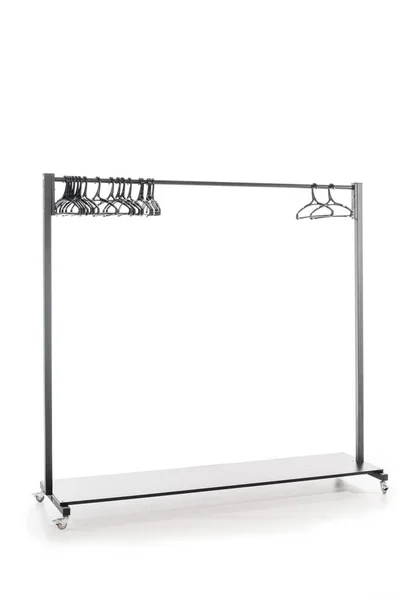 Hatstand with hangers on white background with copy space — Stock Photo