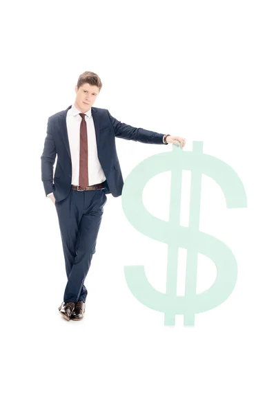 Successful businessman posing with big dollar symbol isolated on white — Stock Photo