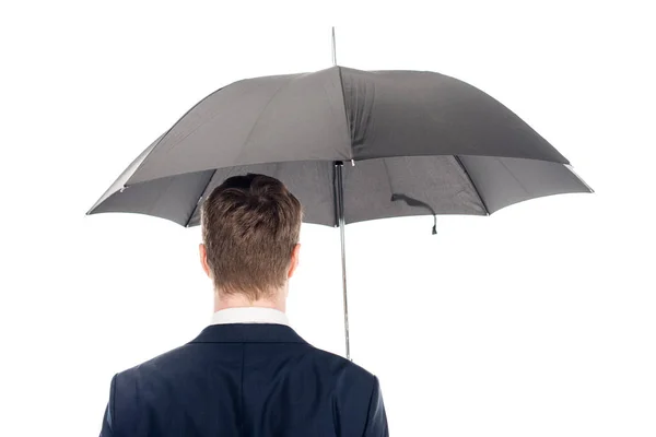Назад взгляд бизнесмена с зонтиком изолированы на белом — стоковое фото