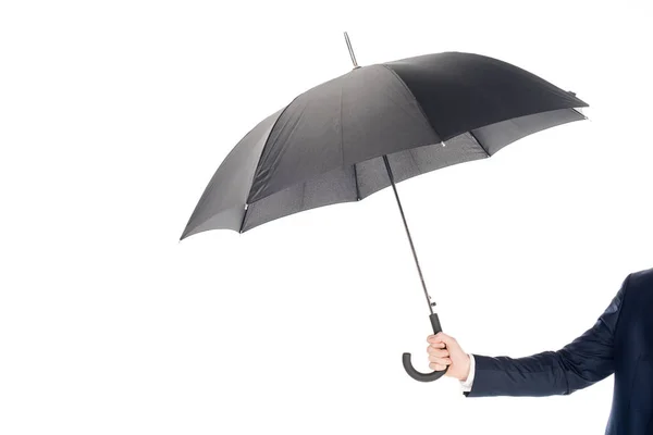 Vue recadrée de l'homme d'affaires tenant parapluie noir isolé sur blanc — Photo de stock