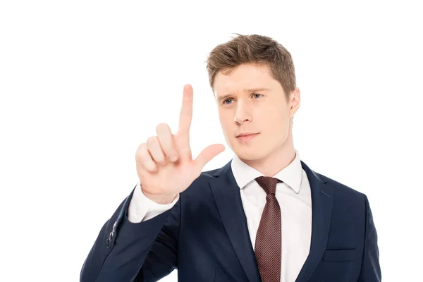 Guapo elegante hombre de negocios tocando algo aislado en blanco - foto de stock