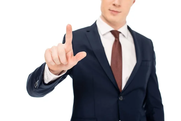 Cropped view of young businessman touching something isolated on white — Stock Photo