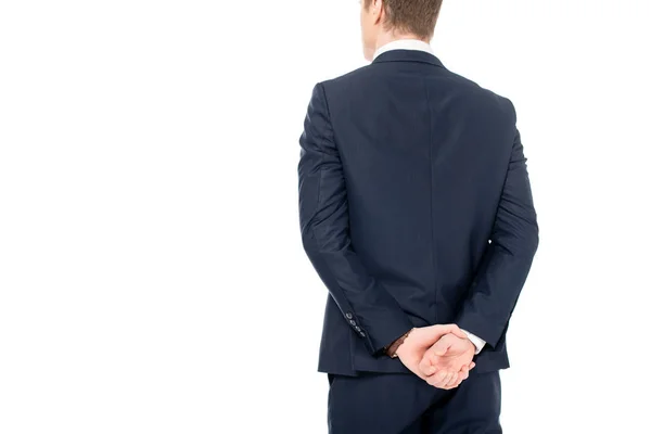 Vista posteriore di uomo d'affari tuta in piedi isolato su bianco — Foto stock