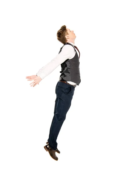 Stylish businessman jumping up isolated on white — Stock Photo