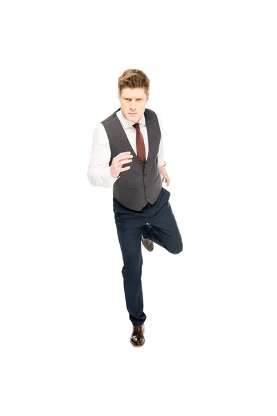 Confident young businessman running isolated on white — Stock Photo