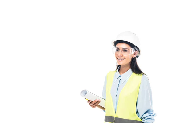 Smiling engineer in protective goggles holding blueprint isolated on white — Stock Photo