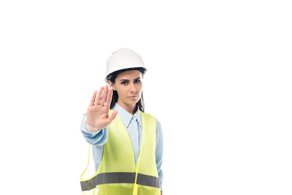 Strict engineer in hardhat showing stop sign isolated on white — Stock Photo