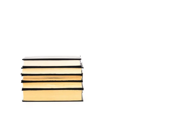 Old black hardcover books with yellow pages isolated on white — Stock Photo