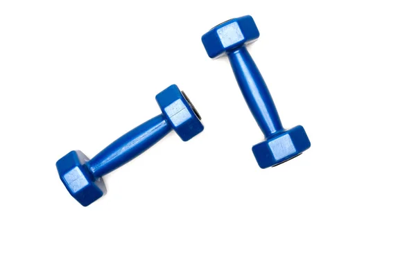 Vista superior de pesas azules aisladas en blanco - foto de stock