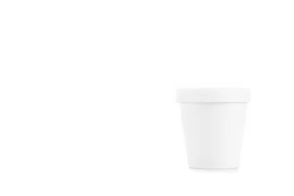 White plastic cup isolated on white with copy space — Stock Photo