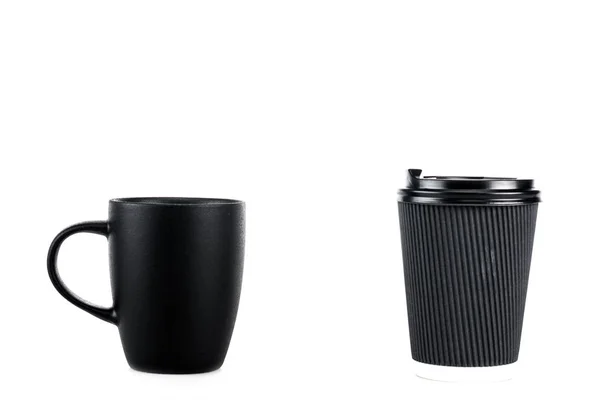 Black ceramic cup and paper cup of coffee isolated on white — Stock Photo