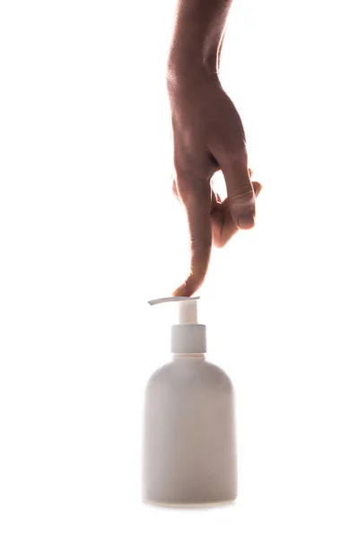 Vista parcial da mulher usando frasco de spray cosmético no branco — Fotografia de Stock