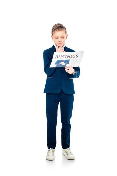 Pensive schoolboy in formal wear reading business newspaper in white — Stock Photo