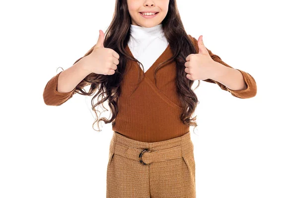 Vista recortada de niño sonriente mostrando pulgares hacia arriba signos aislados en blanco - foto de stock