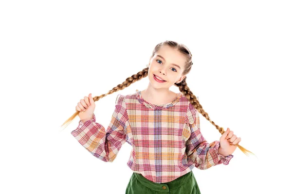 Adorable happy kid looking at camera and holding braids in hands Isolated On White — Stock Photo