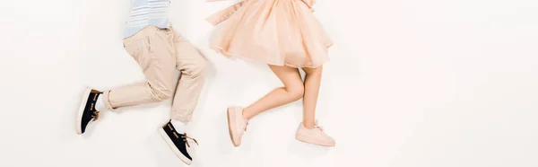 Panoramabild von Kind nahe Freund in rosa Kleid auf weiß — Stockfoto