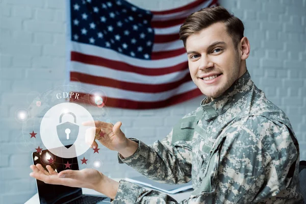 Happy military man gesturing in office near virtual padlock with gdpr lettering — Stock Photo