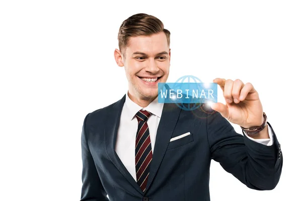 Feliz hombre de negocios gesto y sonriendo mientras mira webinar letras en mientras - foto de stock